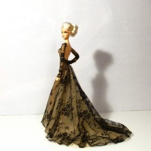 David Bocci y varias de sus Barbies, con diseños, complementos, peinados y maquillajes propios. ::
LR/